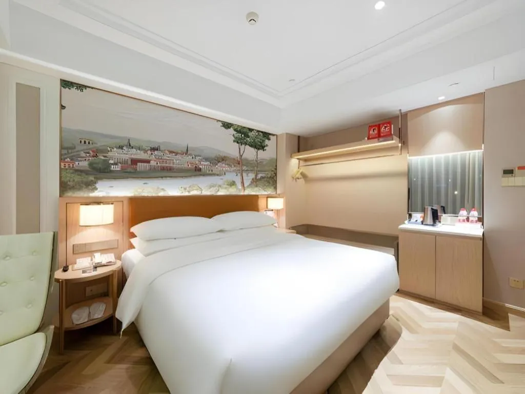 Bed in Vienna Hotel Chongqing West Station Square