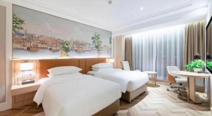 Bed in Vienna Hotel Chongqing West Station Square