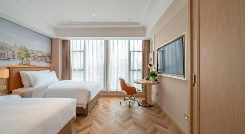 Bed in Vienna Hotel Chongqing West Station Square