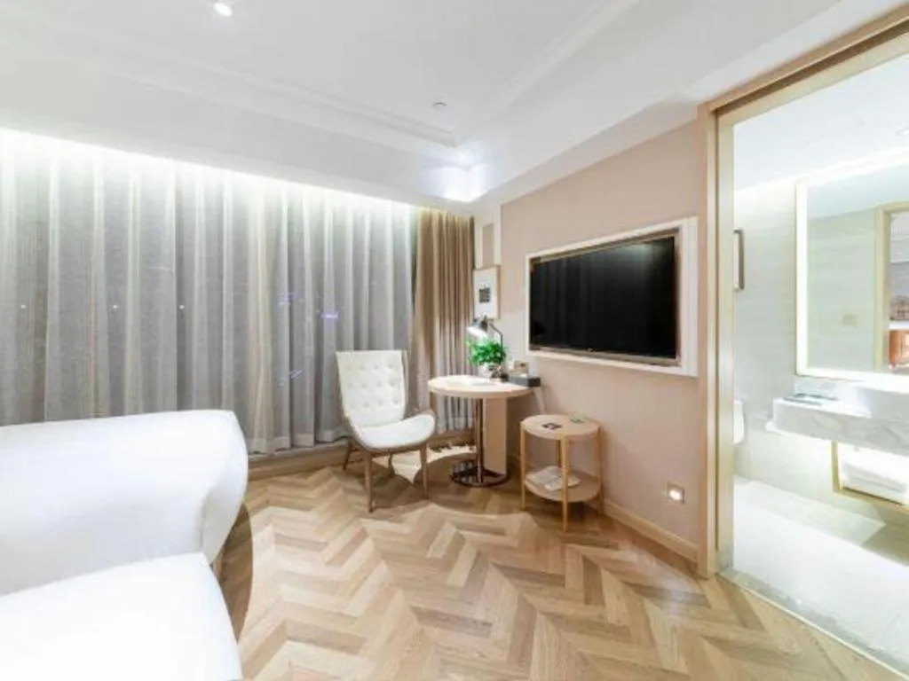 Bed in Vienna Hotel Chongqing West Station Square