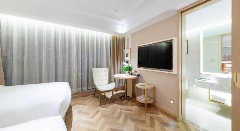 Bed in Vienna Hotel Chongqing West Station Square