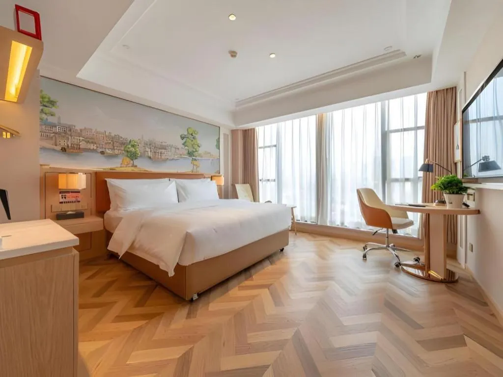 Bed in Vienna Hotel Chongqing West Station Square