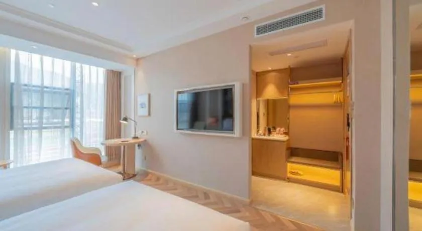 Bed in Vienna Hotel Chongqing West Station Square