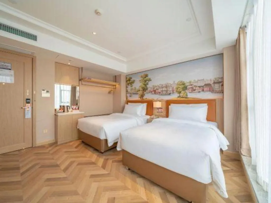 Bed in Vienna Hotel Chongqing West Station Square