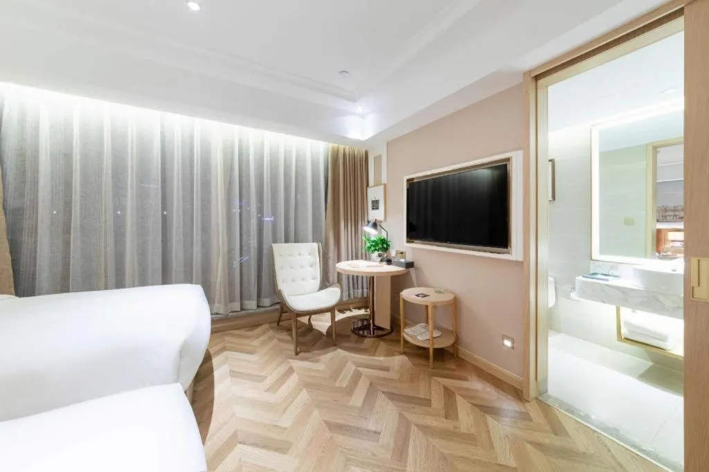 Bed in Vienna Hotel Chongqing West Station Square