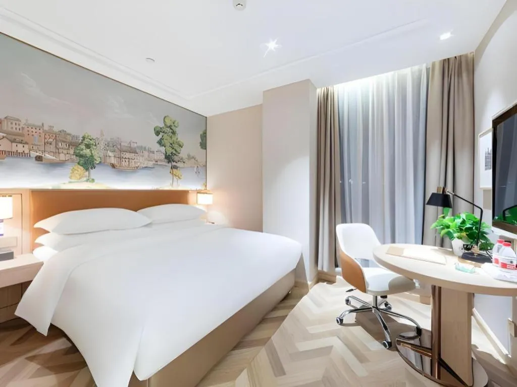 Bed in Vienna Hotel Chongqing West Station Square