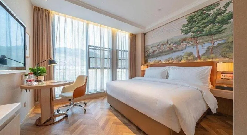 Bed in Vienna Hotel Chongqing West Station Square