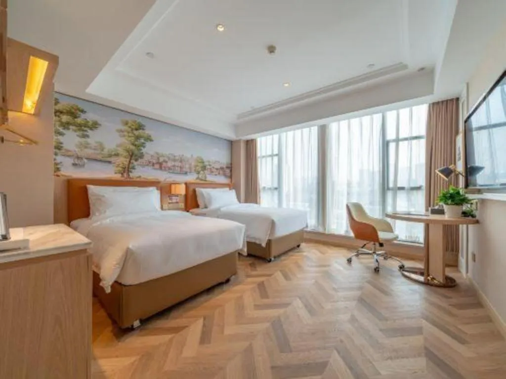 Bed in Vienna Hotel Chongqing West Station Square