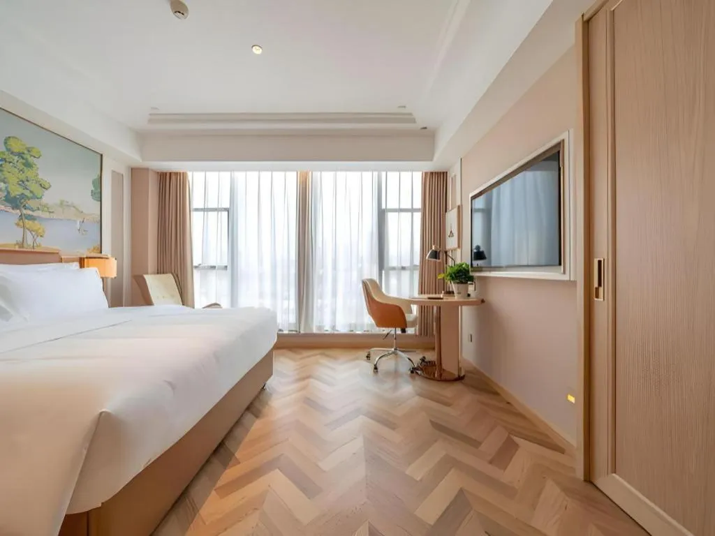 Bed in Vienna Hotel Chongqing West Station Square