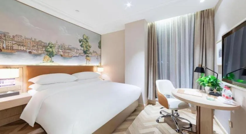 Bed in Vienna Hotel Chongqing West Station Square