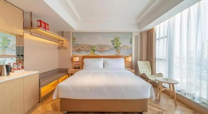 Bed in Vienna Hotel Chongqing West Station Square