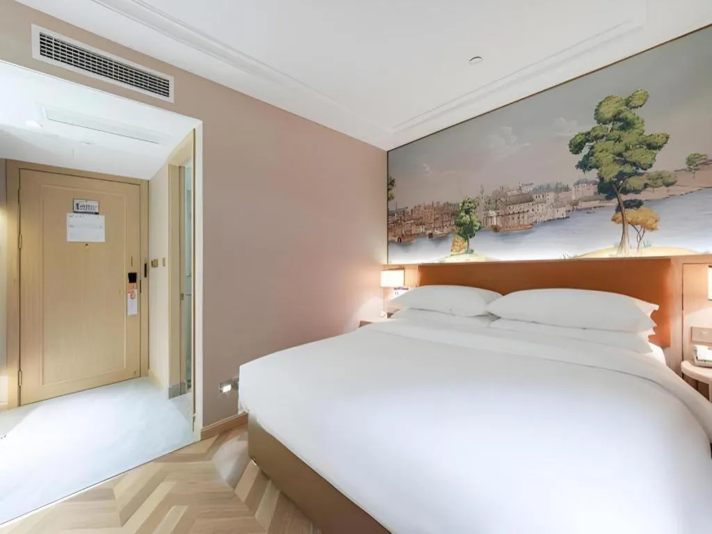 Bed in Vienna Hotel Chongqing West Station Square