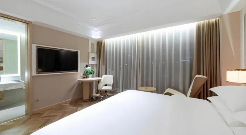 Bed in Vienna Hotel Chongqing West Station Square