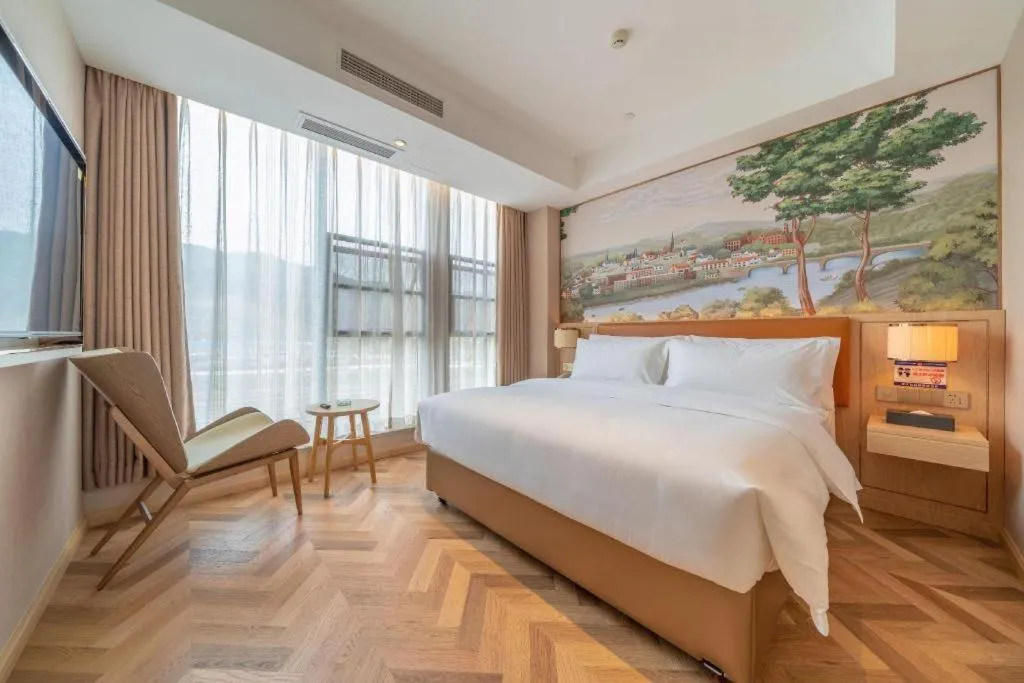 Bed in Vienna Hotel Chongqing West Station Square