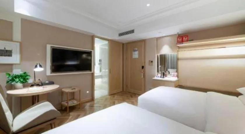 Bed in Vienna Hotel Chongqing West Station Square