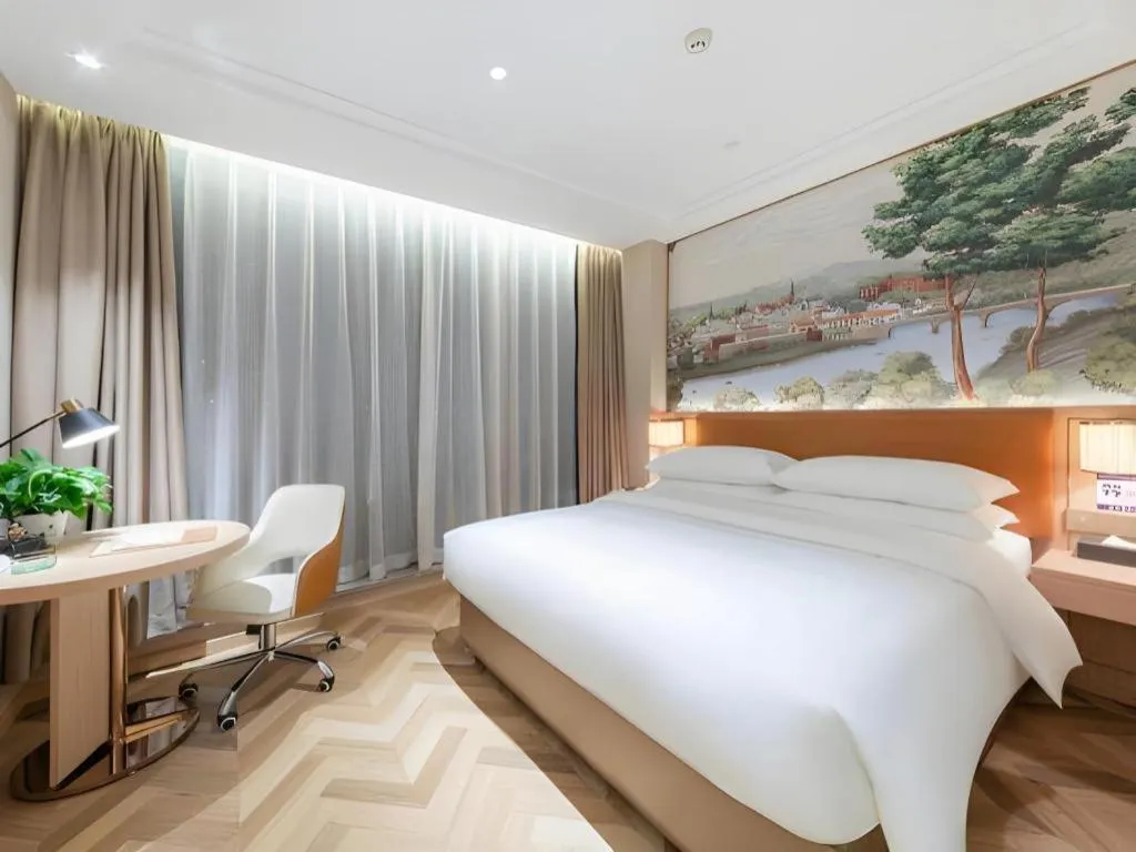 Bed in Vienna Hotel Chongqing West Station Square