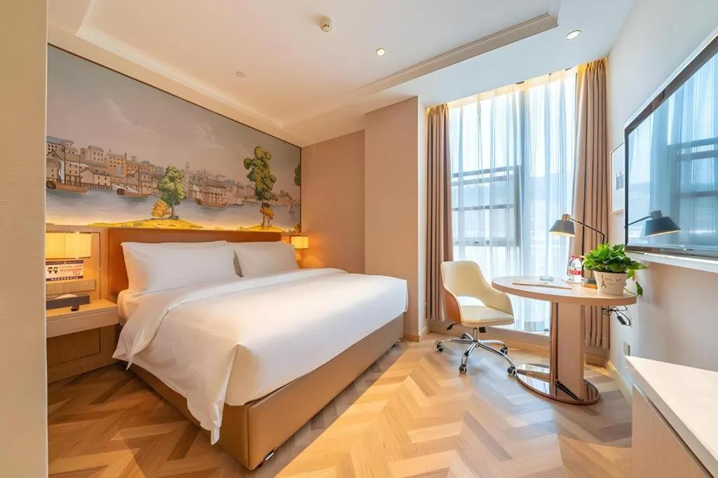 Bed in Vienna Hotel Chongqing West Station Square