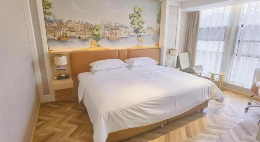 Bed in Vienna Hotel Chongqing West Station Square