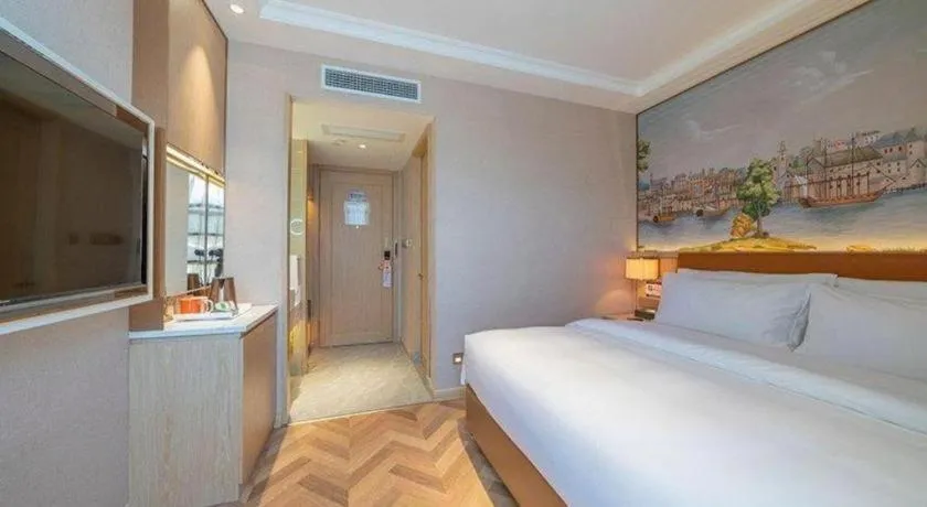 Bed in Vienna Hotel Chongqing West Station Square