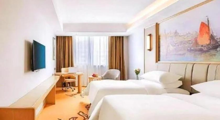 Bed in Vienna Hotel Jinjiang Bus Passenger Station