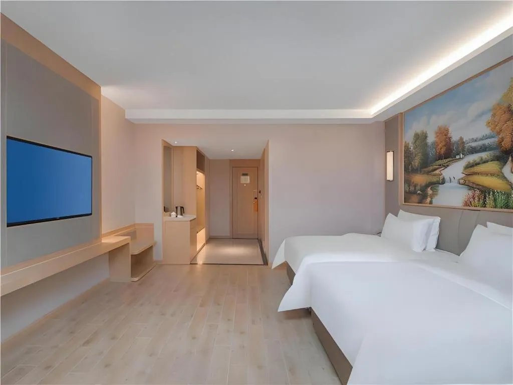 Bed in Vienna Hotel Yuxi Hongta Avenue High-Speed Railway Station