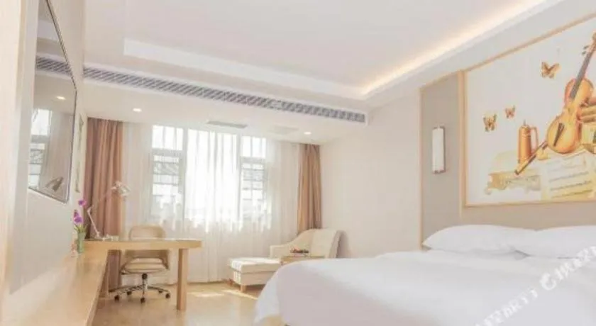 Bed in Vienna Hotel Yuxi Hongta Avenue High-Speed Railway Station