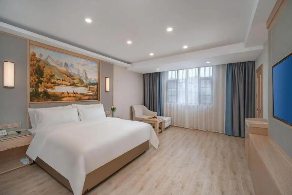 Bed in Vienna Hotel Yuxi Hongta Avenue High-Speed Railway Station