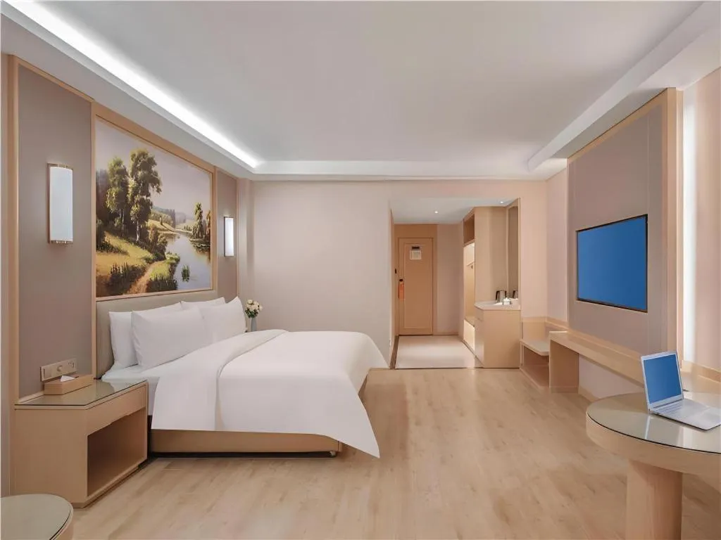 Bed in Vienna Hotel Yuxi Hongta Avenue High-Speed Railway Station