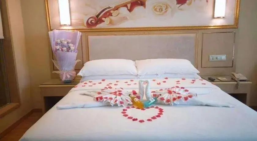 Bed in Vienna Hotel Chongqing Shizhu Stadium Bed in Vienna Hotel Chongqing Shizhu Stadium