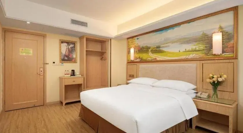 Bed in Vienna Hotel Chongqing Shizhu Stadium Bed in Vienna Hotel Chongqing Shizhu Stadium