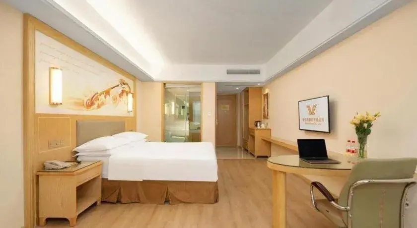 Bed in Vienna Hotel Chongqing Shizhu Stadium Bed in Vienna Hotel Chongqing Shizhu Stadium