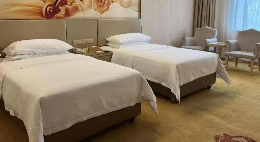 Bed in Vienna Hotel Guangdong Huidong Herung Pedestrian Street Bed in Vienna Hotel Guangdong Huidong Herung Pedestrian Street