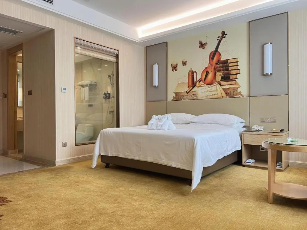 Bed in Vienna Hotel Guangdong Huidong Herung Pedestrian Street