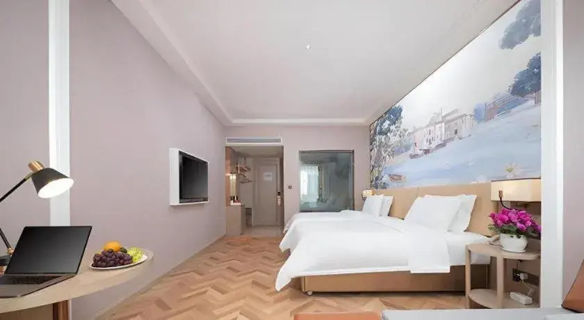Bed in Vienna Hotel Lincang New Asia Pacific Times Square Bed in Vienna Hotel Lincang New Asia Pacific Times Square