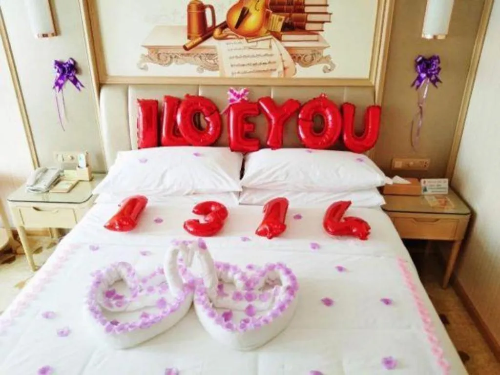 Bed in Vienna Hotel Guangxi Zhongshan Central Plaza West High-Speed Railway Station