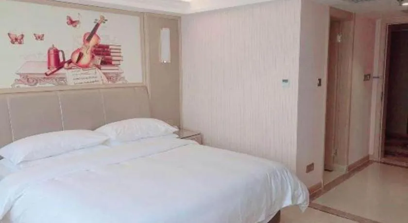 Bed in Vienna Hotel Guangxi Zhongshan Central Plaza West High-Speed Railway Station