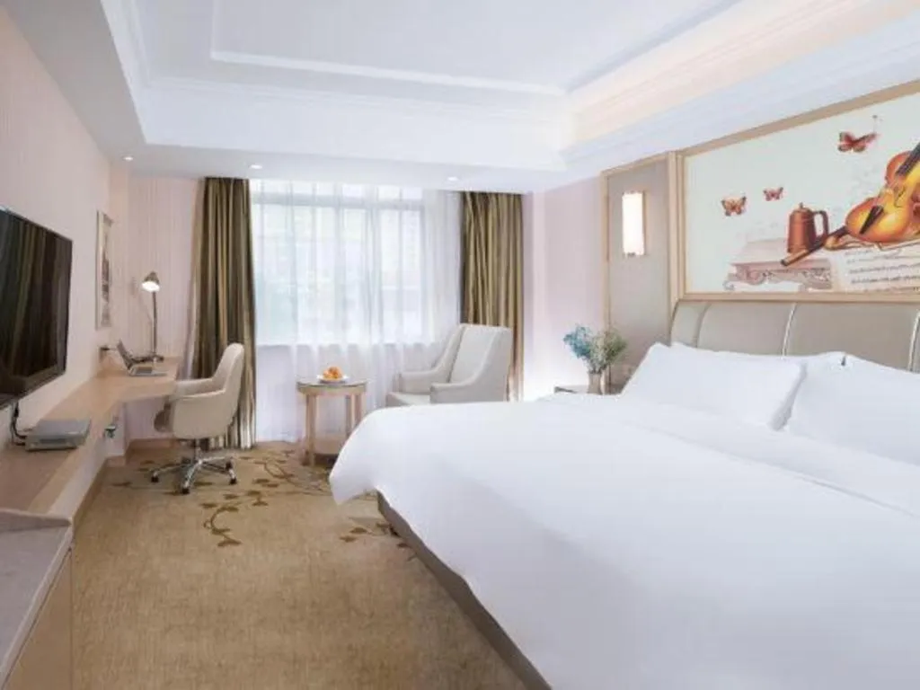 Bed in Vienna Hotel Guangxi Zhongshan Central Plaza West High-Speed Railway Station