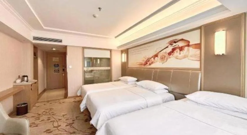 Bed in Vienna Hotel Guangxi Zhongshan Central Plaza West High-Speed Railway Station