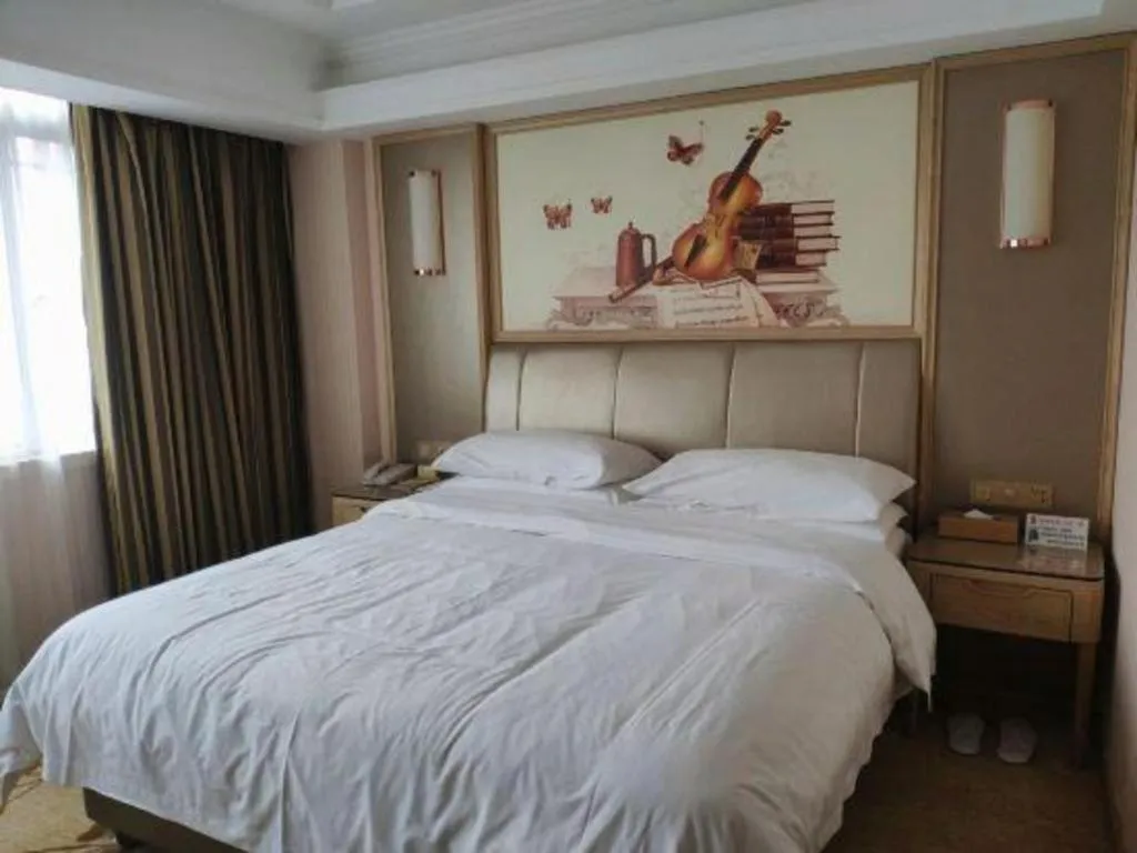 Bed in Vienna Hotel Guangxi Zhongshan Central Plaza West High-Speed Railway Station