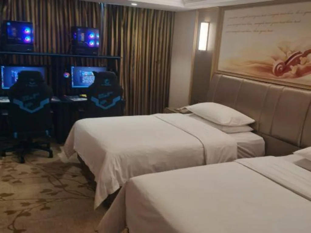 Bed in Vienna Hotel Guangxi Zhongshan Central Plaza West High-Speed Railway Station