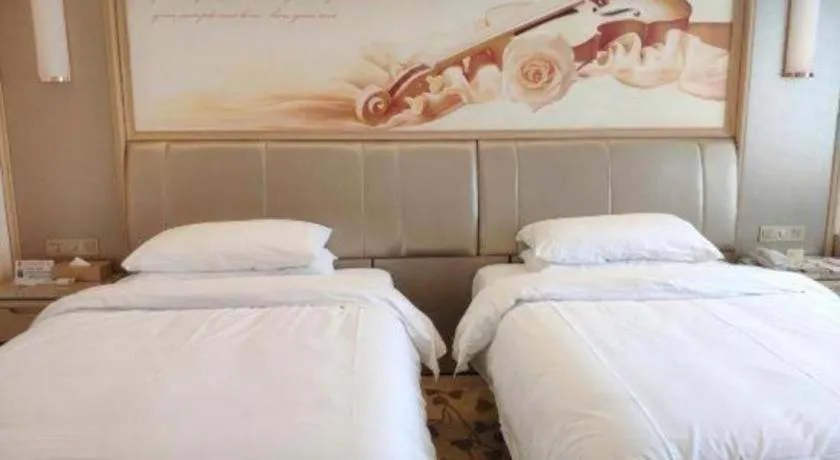 Bed in Vienna Hotel Guangxi Zhongshan Central Plaza West High-Speed Railway Station