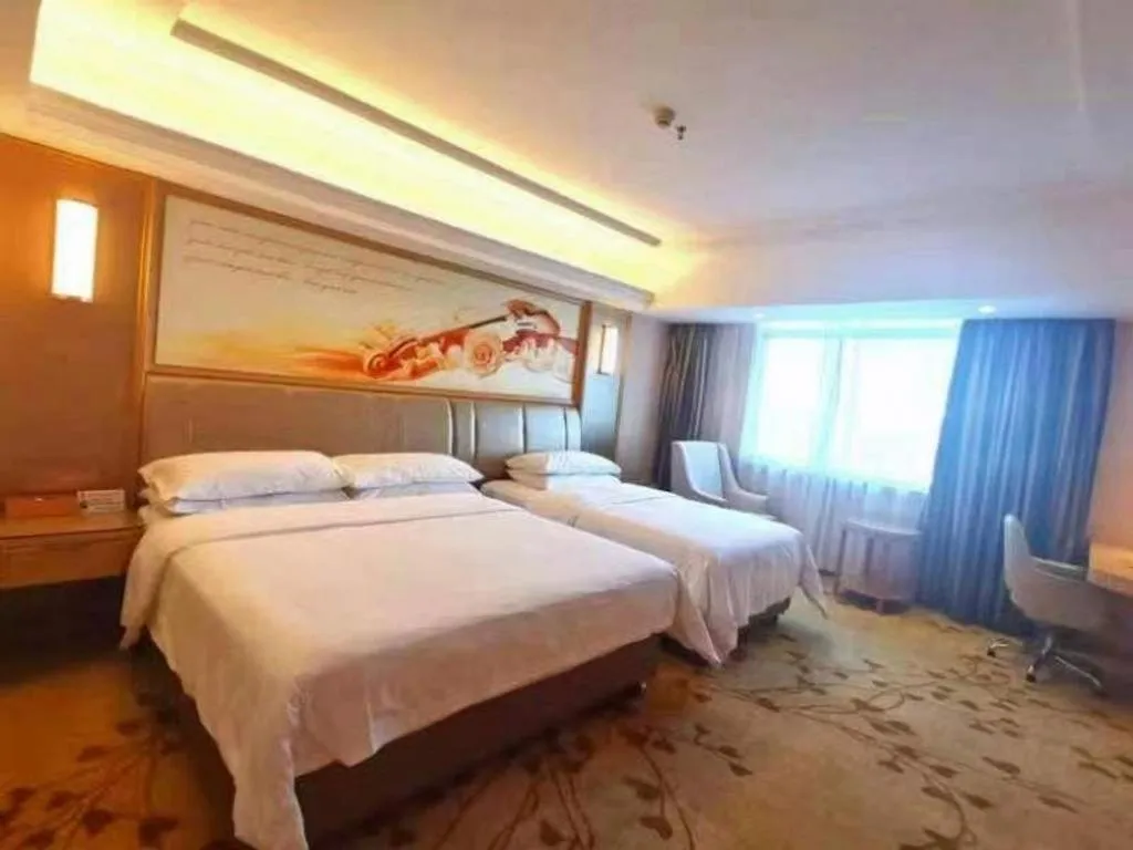 Bed in Vienna Hotel Guangxi Zhongshan Central Plaza West High-Speed Railway Station