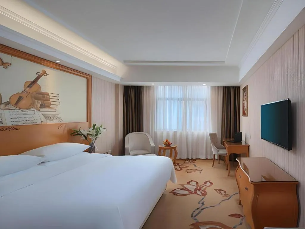 Bed in Vienna Hotel Hubei Jinzhou Jianli Jiangcheng