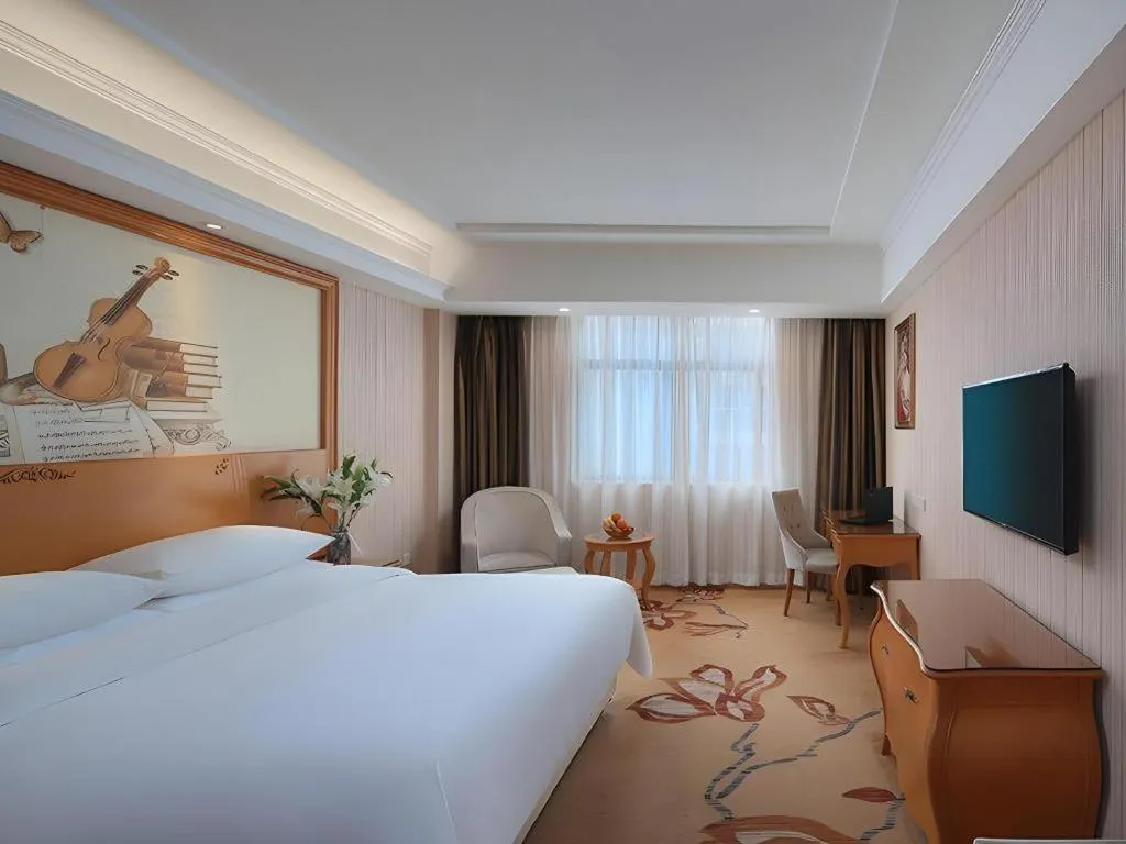 Bed in Vienna Hotel Hubei Jinzhou Jianli Jiangcheng