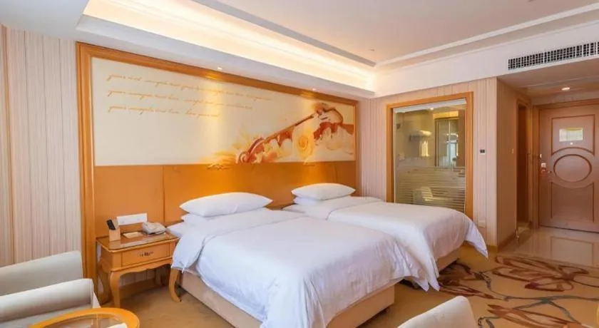 Bed in Vienna Hotel Hubei Jinzhou Jianli Jiangcheng