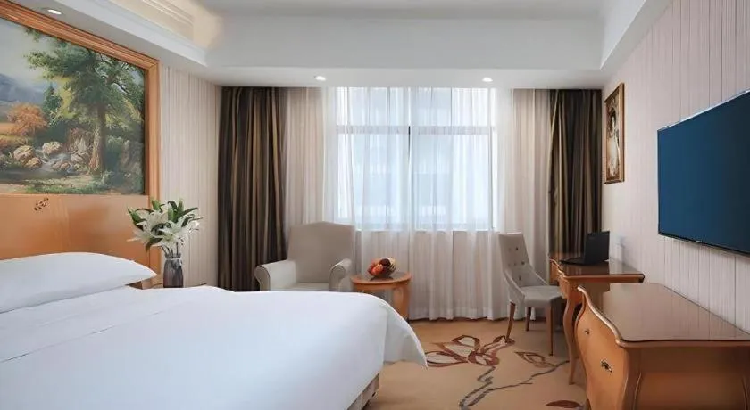 Bed in Vienna Hotel Hubei Jinzhou Jianli Jiangcheng