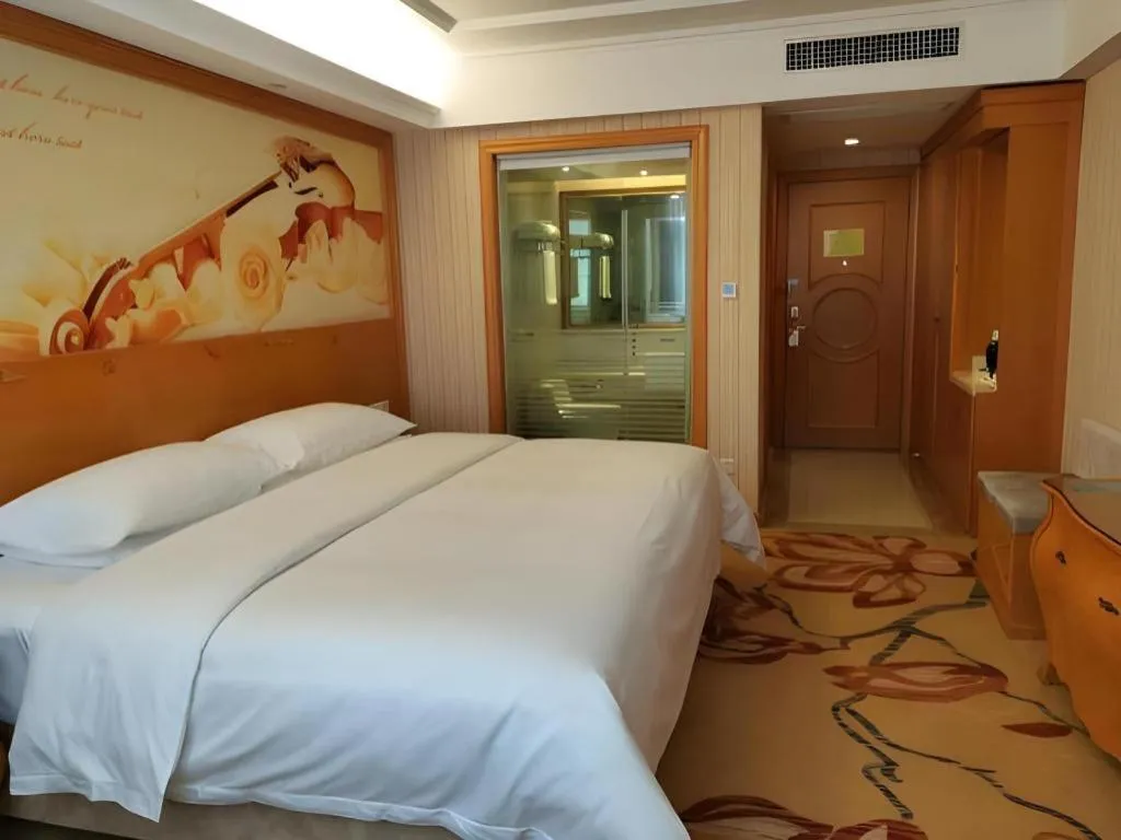 Bed in Vienna Hotel Hubei Jinzhou Jianli Jiangcheng