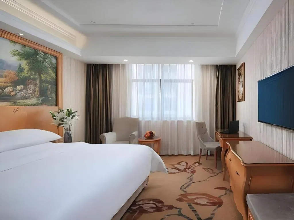 Bed in Vienna Hotel Hubei Jinzhou Jianli Jiangcheng