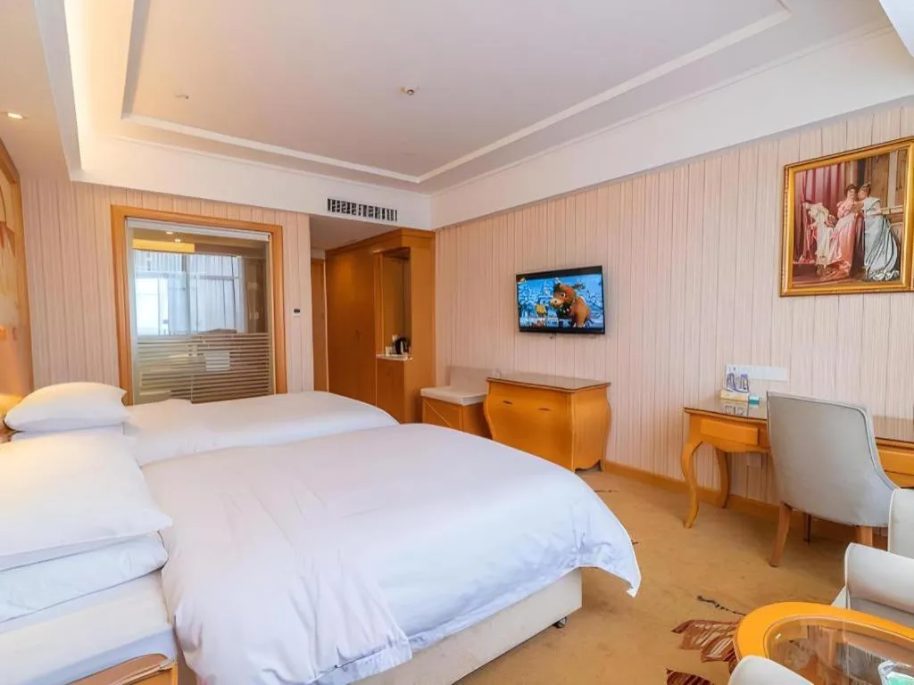 Bed in Vienna Hotel Hubei Jinzhou Jianli Jiangcheng