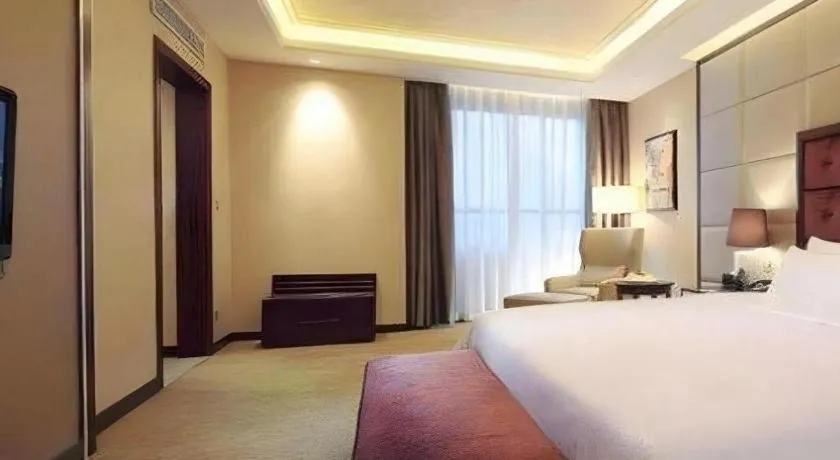 Bed in Venus Royal Hotel Shenzhen International Exhibition Center